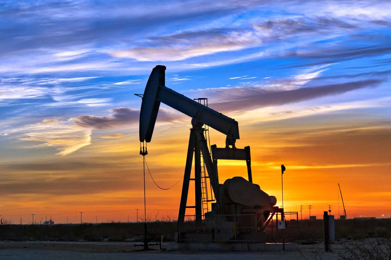 dreamstime m 158389794 Dawn Over Petroleum Pump in Texas Permian Basin